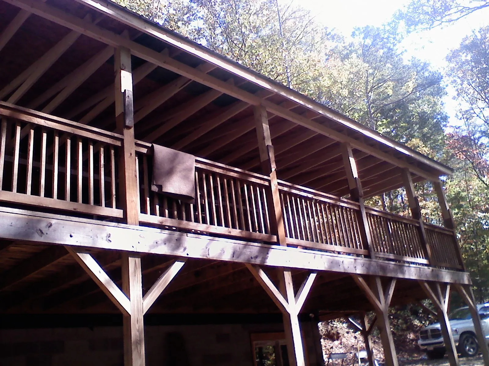 Timber framing under a new elevated porch and deck — Roof Leak Repair in Big Arm by Roofing Brothers